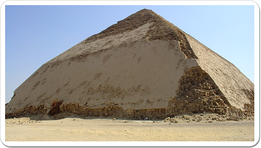 Snofru’s Bent Pyramid, its characteristic shape the result of a decrease in angle about halfway up the monument, was the first pyramid built at Dashur.