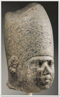 Granite head of an unnamed king.