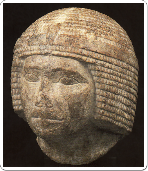 Limestone head of a king, believed to be Kheops.