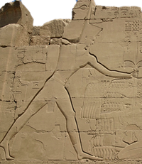 Thutmosis III slaying his enemies on the VIIIth Pylon of the temple of Amun-Re at Karnak.