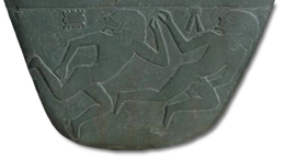 Two slain enemies, each perhaps representing a city or village that was conquered by Narmer.