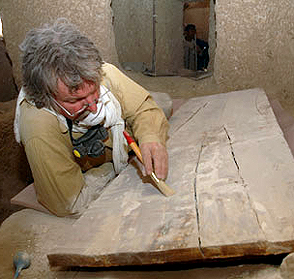 Professor Willems cleans the coffin lid found in Henu's tomb